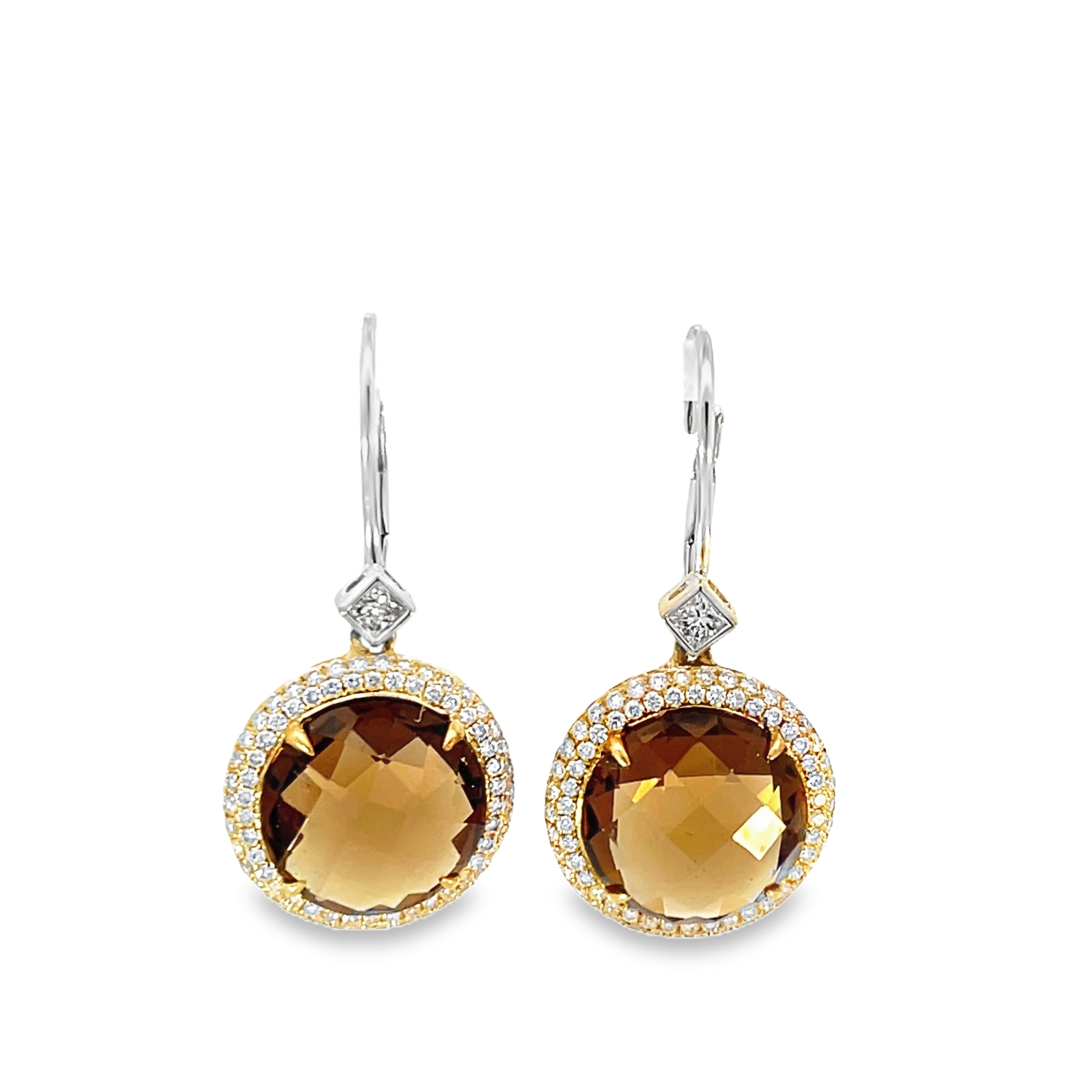 These exquisite earrings feature stunning brown gemstones set in a delicate white gold frame. The round-cut stones are surrounded by a halo of sparkling diamonds, adding an extra touch of elegance and sophistication. Perfect for any special occasion or to elevate your everyday style. 18k RG 4.53 Gram .99 Carat Diamond 