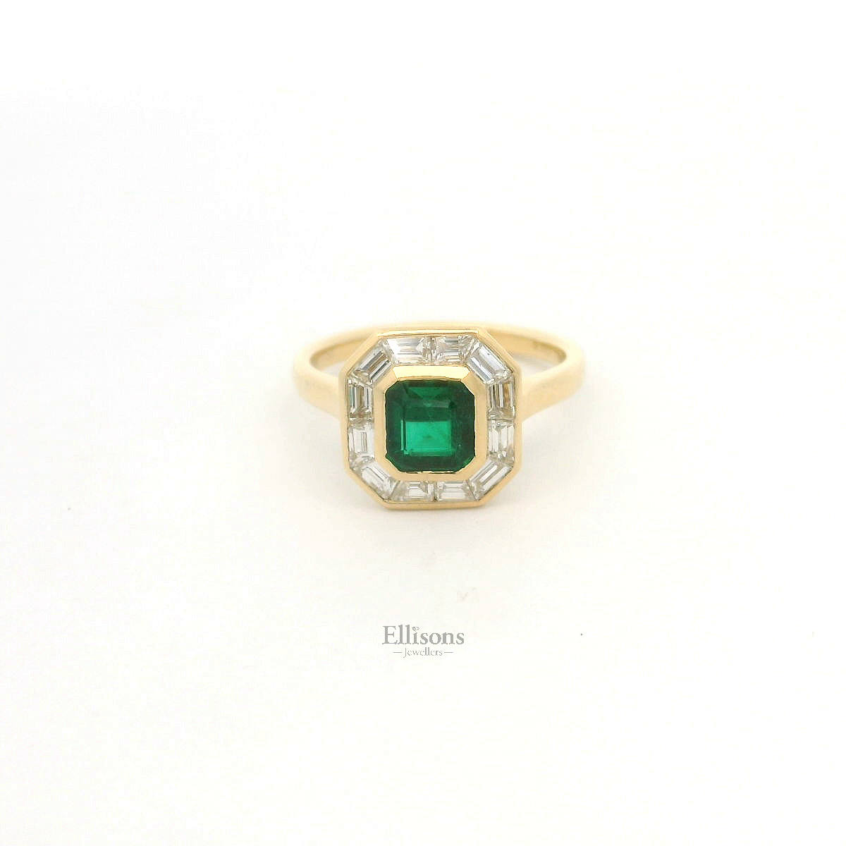 18ct Gold Emerald and Baguette Diamond Cluster ring 18ct Gold Emerald and Baguette Diamond Cluster ring