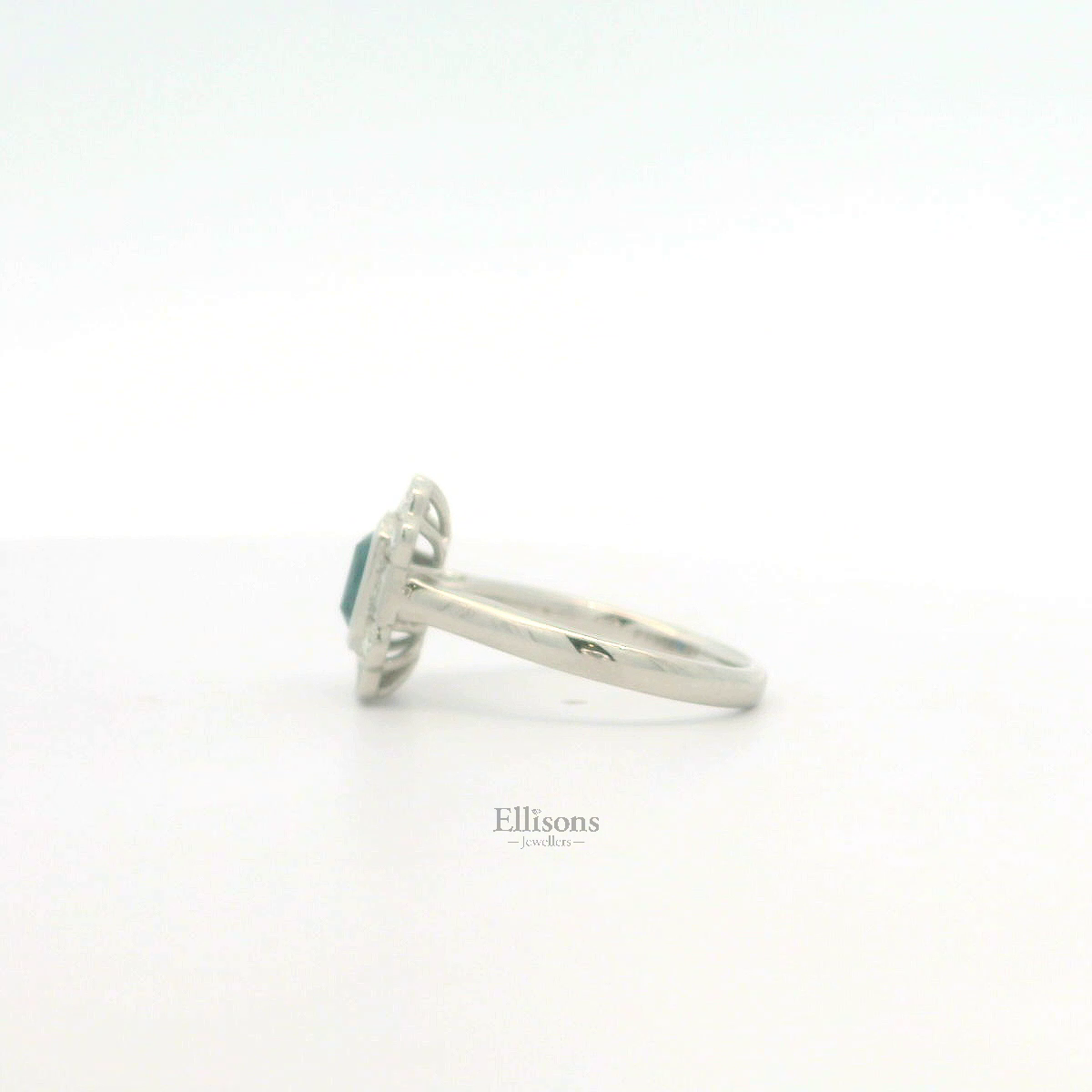 Platinum Teal Sapphire and Princess Diamond cluster ring Platinum Teal Sapphire and Princess Diamond cluster ring