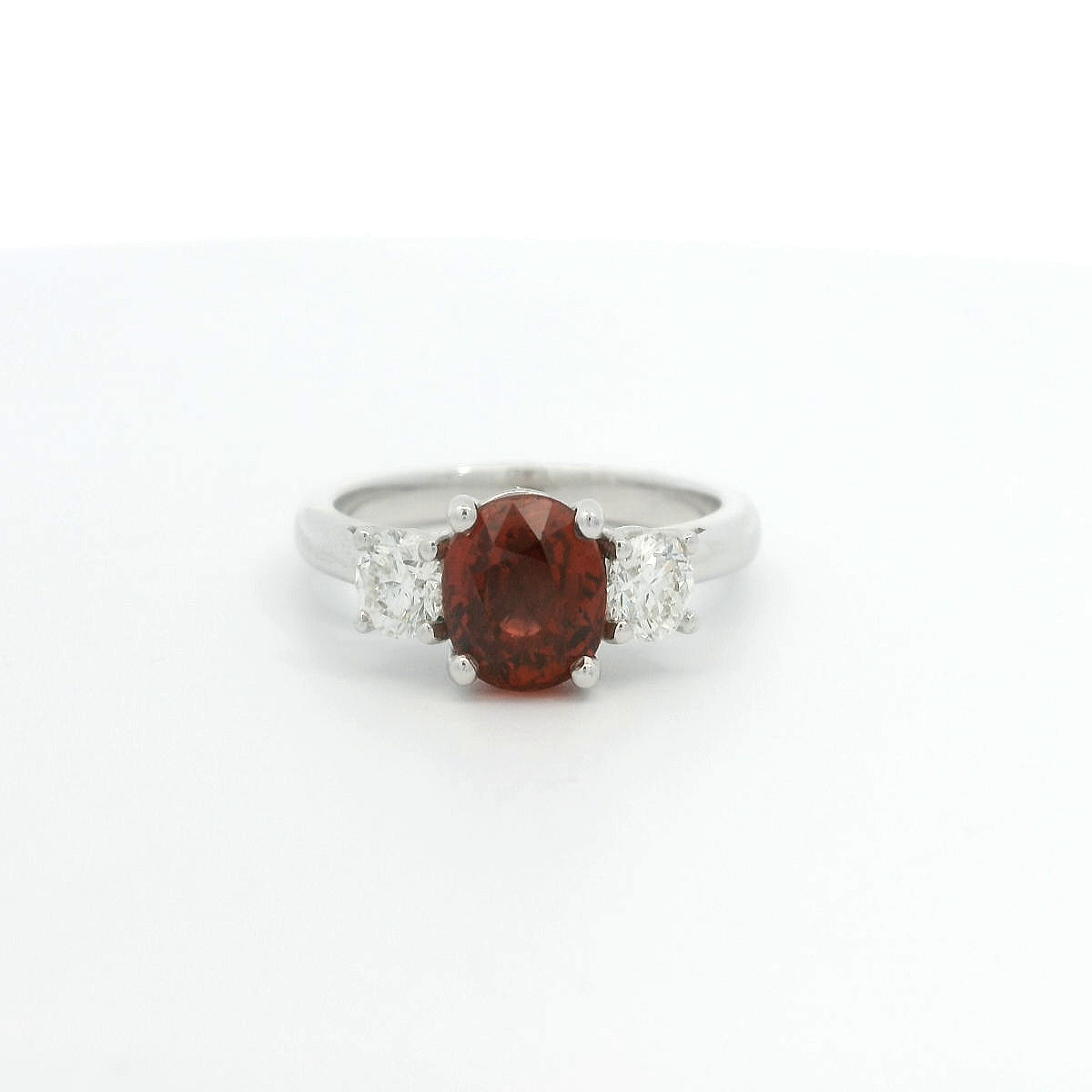 18ct White Gold 3-Stone Orange/Red Sapphire & Diamond Ring 18ct White Gold 3-Stone Orange/Red Sapphire & Diamond Ring