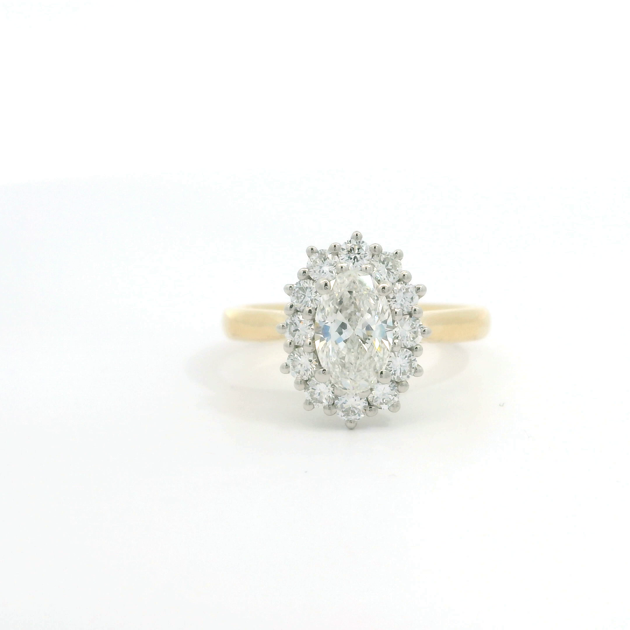 18ct Gold Platinuim Oval Diamond Cluster ring 18ct Gold Platinuim Oval Diamond Cluster ring