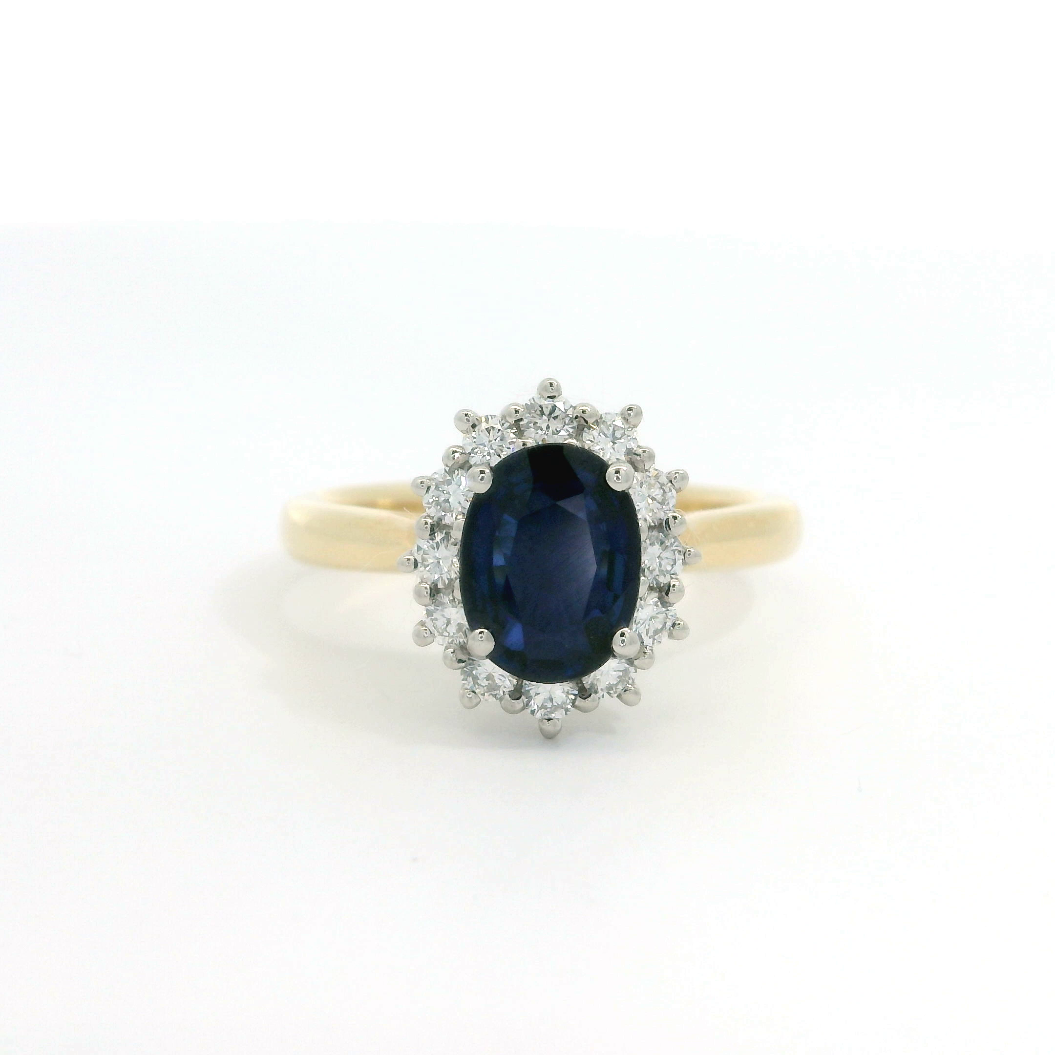 18ct Gold Platinum Sapphire and Diamond oval cluster ring 18ct Gold Platinum Sapphire and Diamond oval cluster ring