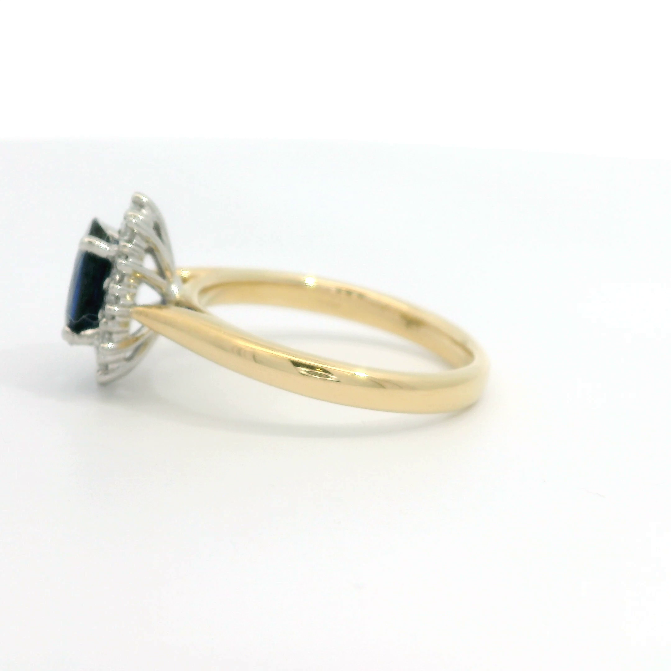 18ct Gold Platinum Sapphire and Diamond oval cluster ring 18ct Gold Platinum Sapphire and Diamond oval cluster ring