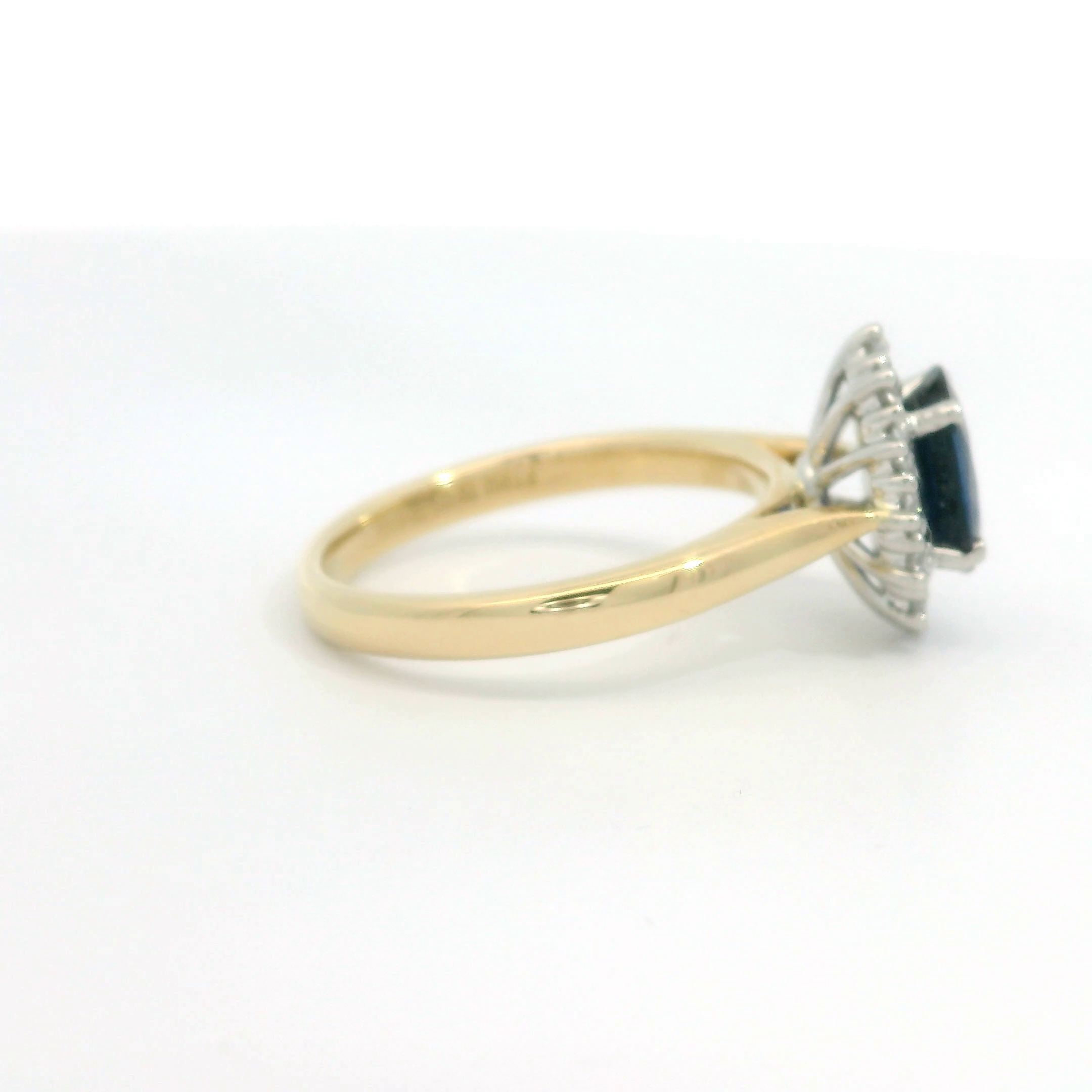 18ct Gold Platinum Sapphire and Diamond oval cluster ring 18ct Gold Platinum Sapphire and Diamond oval cluster ring