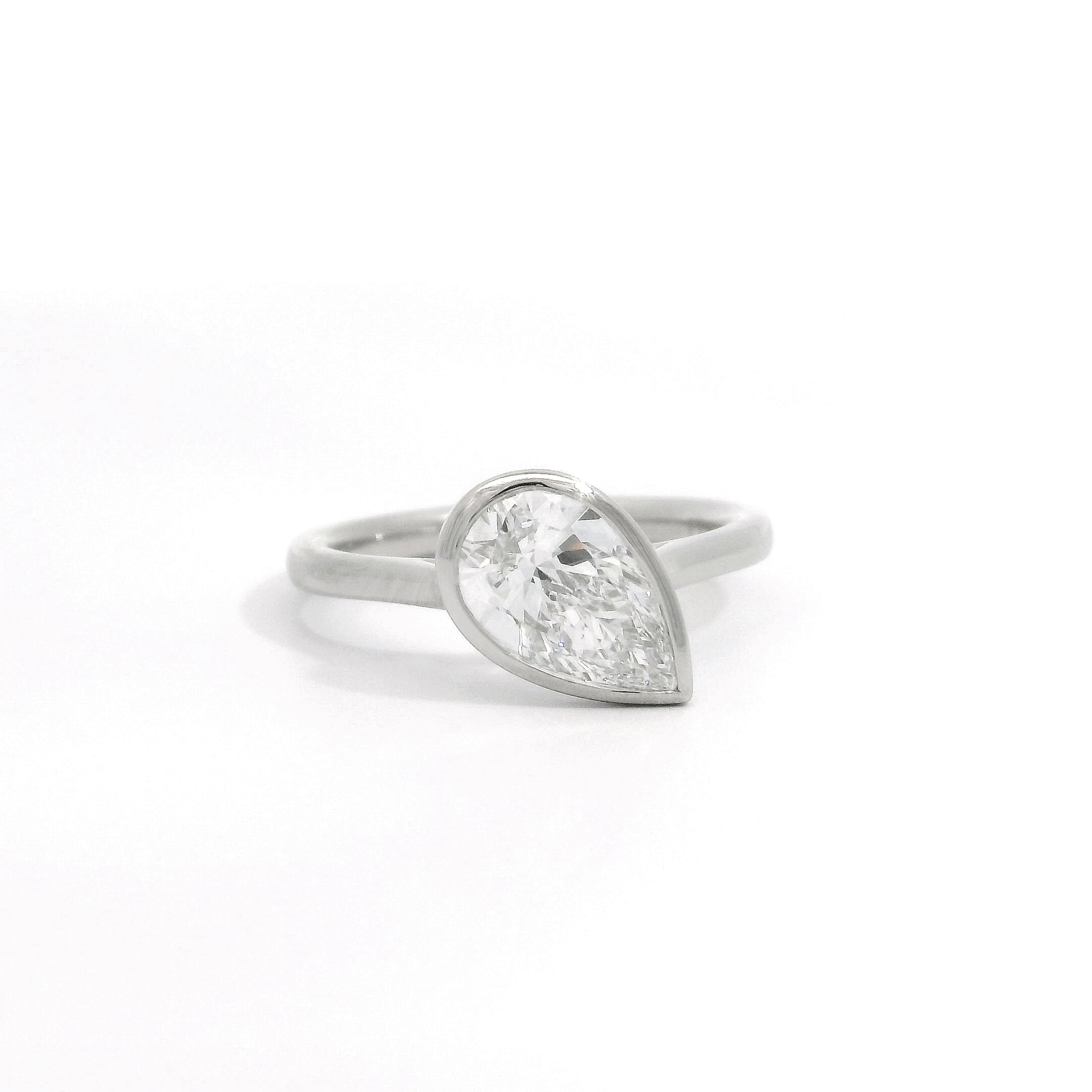 Platinum Pear Solitaire Lab Grown Diamond Bezel ring Platinum Pear Solitaire Lab Grown Diamond Bezel ring